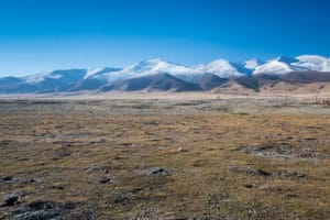 tibetan plain with mountains at outskirt